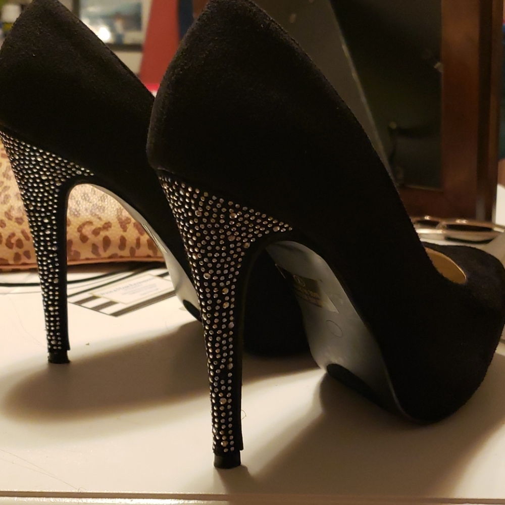 The heels are a piece of art. Very shiny and very